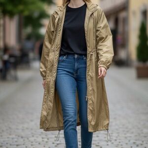 A new day NWT Medium or Large raincoat